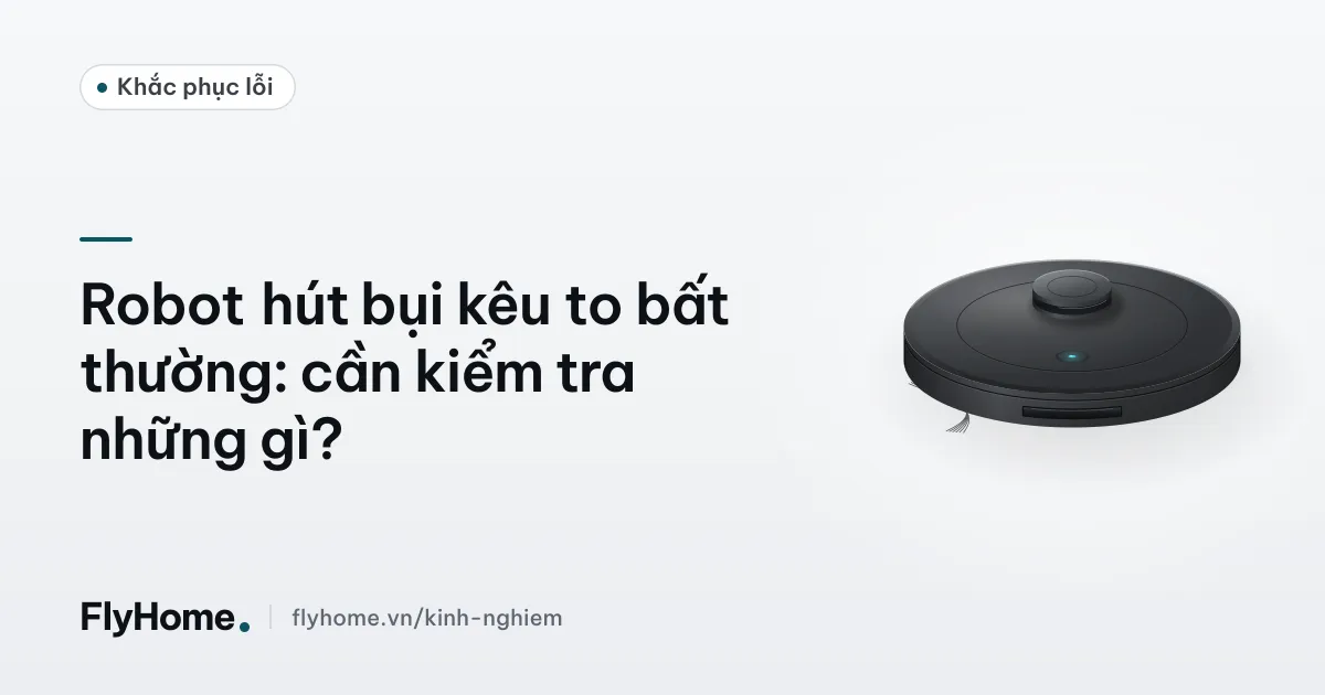 Robot hút bụi được lật ngửa trên khăn mềm để kiểm tra chổi chính và bánh xe